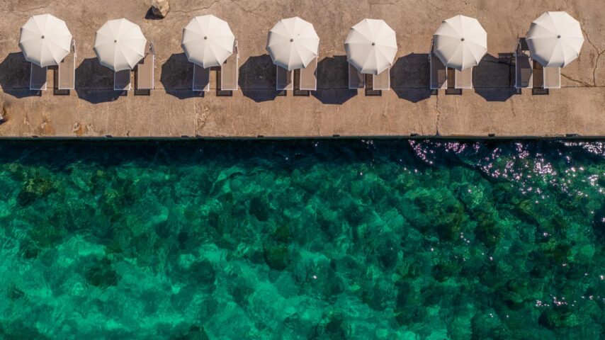 Sonnenschirma am Strand, Hotel Punta Sonnenschirma am Strand, Hotel Punta